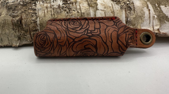 A rose pattern on the Classic Leather Lighter Sleeve
